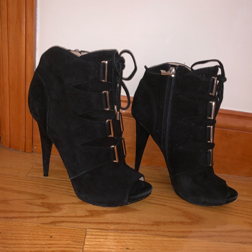 Black and gold lace up booties 
Good condition